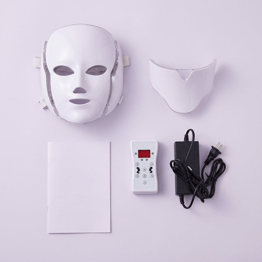 Contenido de la caja: mascarilla LED, pieza del cuello, mando, adaptador de corriente e instrucciones